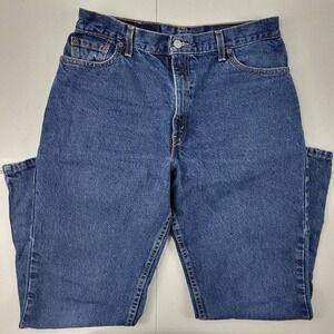 Vintage Levi's usa jeans 550 tapered‎ leg 24 mis 1881 blue 32x30 women's